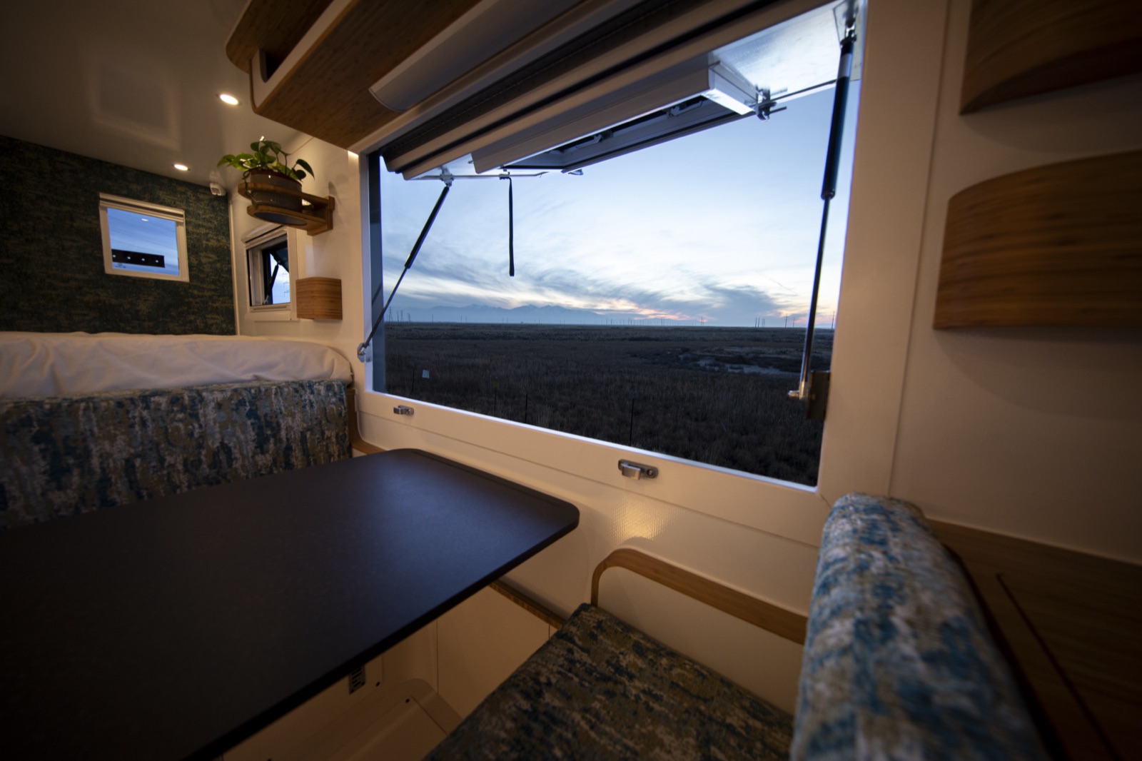 Dining nook with an open window onto the plains